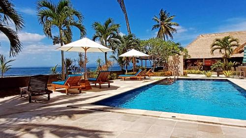 Melaya Bed & Breakfast | Melaya Beach Resort Queen Bed