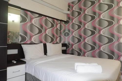 Surabaya Apartment | Minimalist 2BR Apartment at Dian Regency By Travelio