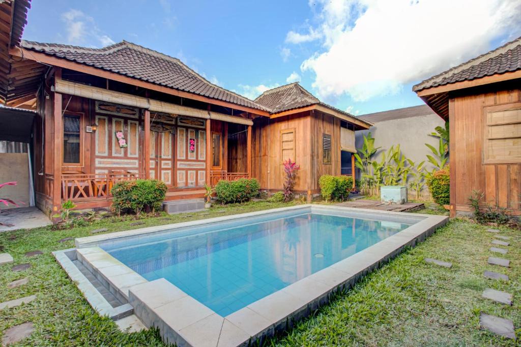 Padonan Hotel | OYO 3834 House Tien