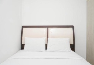 Spacious 2BR Green Bay Pluit Apartment By Travelio