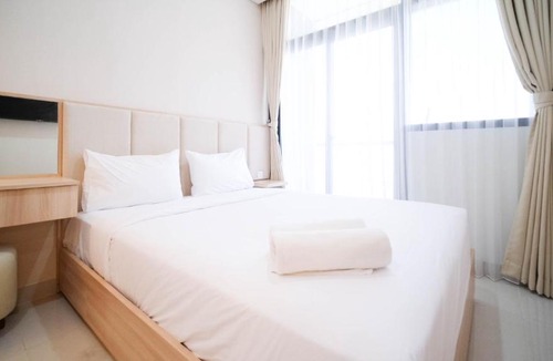 Surabaya Apartment | Cozy Studio Connected to Mall at The Vertu Apartment By Travelio