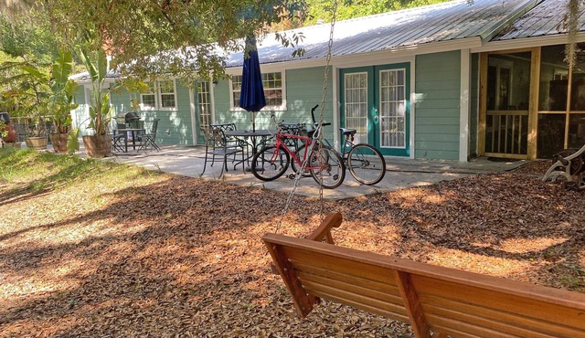 A comfortable home in a quiet neighborhood graced with Spanish Moss draped oaks. in Darien