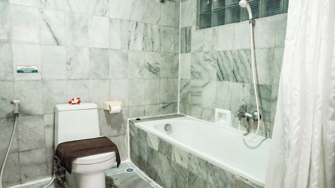 Photo of Bathroom in Kartika Plaza