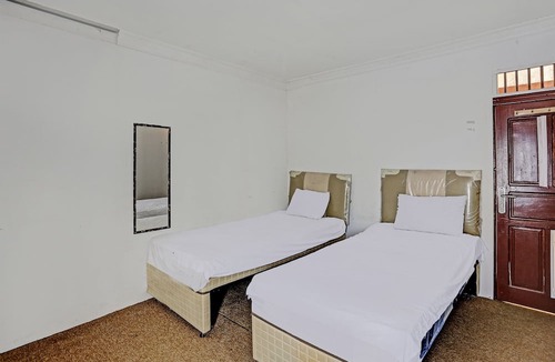 Kotabangun Hotel | SPOT ON 92529 Penginapan Wisma Bintang Syariah Near MTs Al Ma'arif Kota Bangun