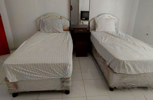 Central Kalimantan Hotel | Hotel O Wisma Pundu Syariah Near Kantor Camat Kota Besi