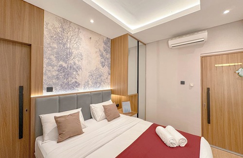 Surabaya Apartment | Modern Look With Wooden Accent 3Br At Kondominium Puncak Marina Apartment