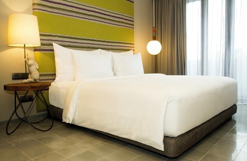Drupadi Hotel | IKOSHAROLD Suites Seminyak