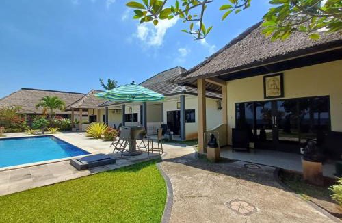 Melaya Bed & Breakfast | Melaya Beach Resort Queen Bed