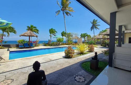 Melaya Bed & Breakfast | Melaya Beach Resort Queen Bed