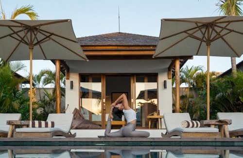 Beraban Hotel | EHOA NYANYI BEACH Boutique Hotel - In front of entrance to NUANU