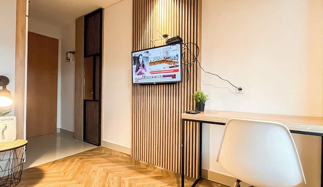 Wooden Nest 2Br Without Living Room At Evenciio Margonda Apartment in Depok