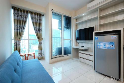 Comfy and Elegant 2BR Tifolia Apartment Pulomas Rawamangun By Travelio in Jakarta